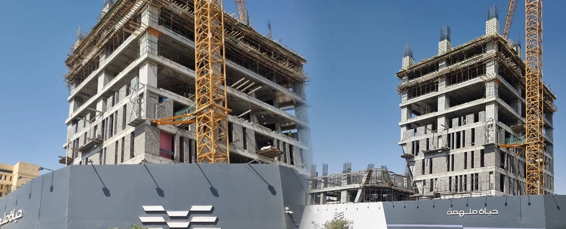 Perspective view of BURJ QARAR showcasing the high-rise office tower and modern urban architecture.